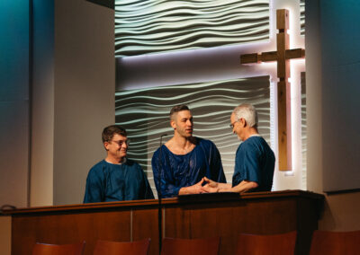 Man getting baptized in a church