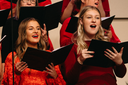 Snow falling outside a church