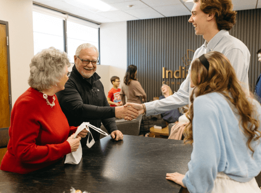 Adults shaking hands