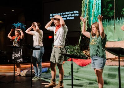 VBS leaders teaching music