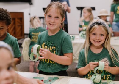 VBS kids doing crafts