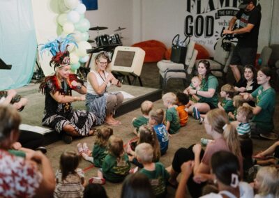VBS leaders teaching actions to kids