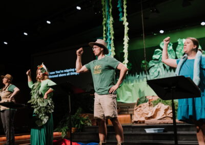 VBS leaders leading music