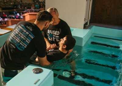 Mark Medina getting baptized