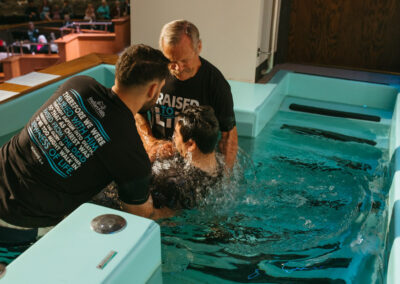 Mark Medina getting baptized