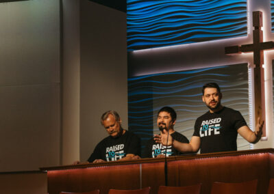 Pastor Mike preaching before baptism